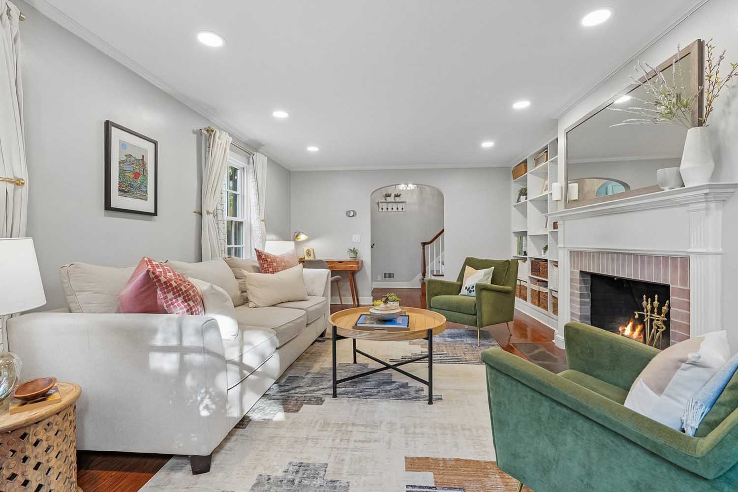 7 60 Wellington Ave - Living Room with wood-burning fireplace - The Elizabeth Winterbottom Team_
